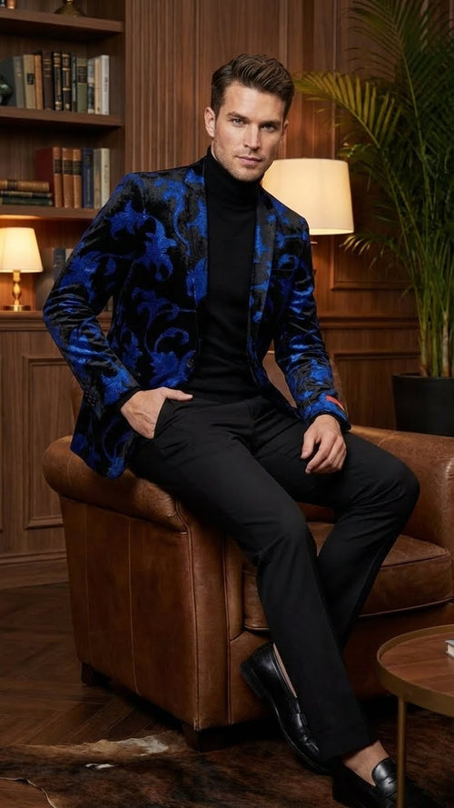 Men's black and royal blue patterned blazer featuring a tailored fit. The fabric appears to have a velvet texture with a floral pattern in blue. The blazer has a single-button closure and notched lapels.