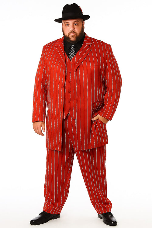 Red pinstripe zoot suit: long jacket, wide lapels, & trousers. Structured silhouette with matching vest. Bold white pinstripes. Black shirt, patterned tie, shoes, & hat.