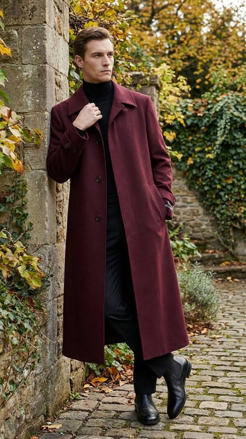 Burgundy Alberto Nardoni men's overcoat. Full-length, straight silhouette, textured fabric, button closure, collar. Solid color, long sleeves, below-knee length. Features side pockets and a tailored fit.