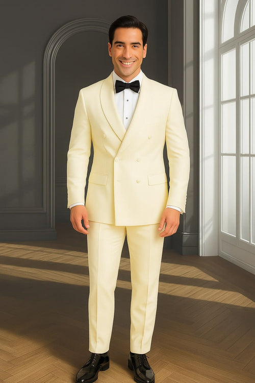 Men's off-white double-breasted tuxedo jacket. Pale cream, shawl lapel, smooth fabric, structured fit. Features two rows of buttons.