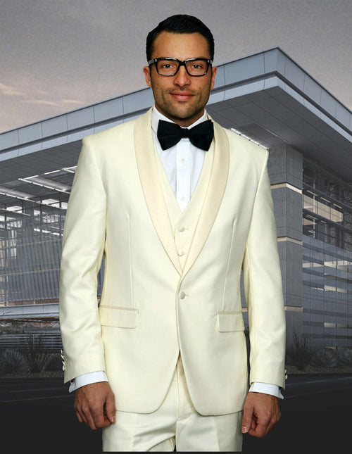 Ivory wool tuxedo with a modern fit. Features a one-button closure, shawl collar, three-piece vest, and straight-leg trousers. Smooth fabric, perfect for prom.