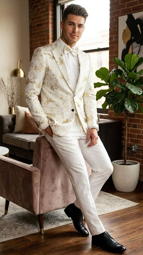 Men's white blazer with gold floral & abstract pattern. Structured, single-breasted, notched lapels. Paired with white pants & shirt.