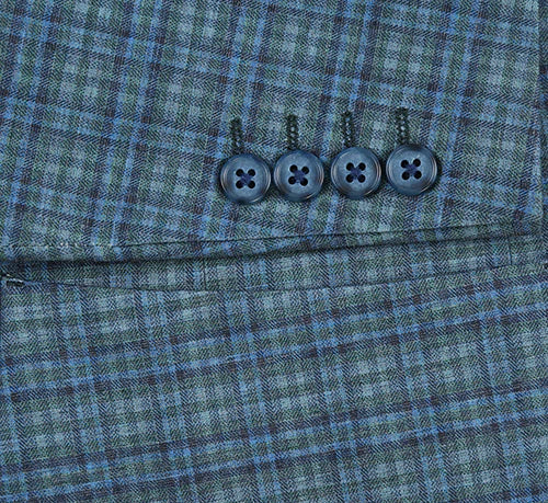 Green-blue check slim fit blazer with interwoven blue lines on a dark green base. Features decorative cuffs (4 buttons) and side pocket.
