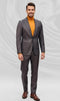 Dark brown, slim-fit men's suit with peak lapels and a pinstripe. Features a tailored structure, one button, and two front pockets. Paired with an orange turtleneck and brown shoes for contrast. Smooth, subtly shiny fabric.