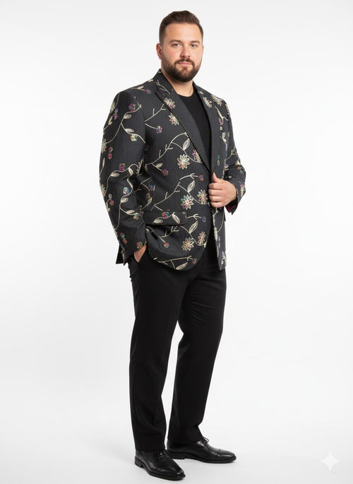 Black floral embroidered blazer. Intricate colorful floral patterns on black fabric. Sharp lapels, single-button closure, tailored fit. Floral embroidery with leaves and berries. Structured with straight sleeves and two frontal pockets. Formal, stylish.