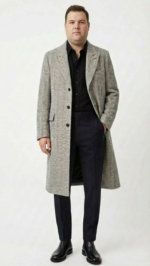 Alberto Nardoni men's grey herringbone overcoat. Classic tailored fit, textured grey fabric with a herringbone pattern. Single-breasted, three buttons, side pockets. Knee-length with a structured wide collar.