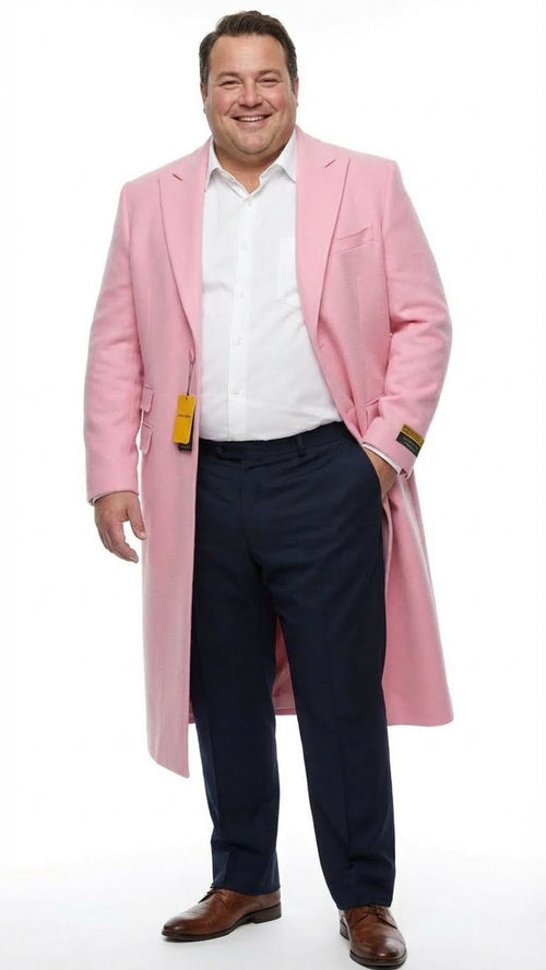 Men's slim fit pink wool blend overcoat with a tailored, straight cut design. Features long sleeves, single-breasted closure, and side pockets. Modelled with navy trousers and brown shoes.