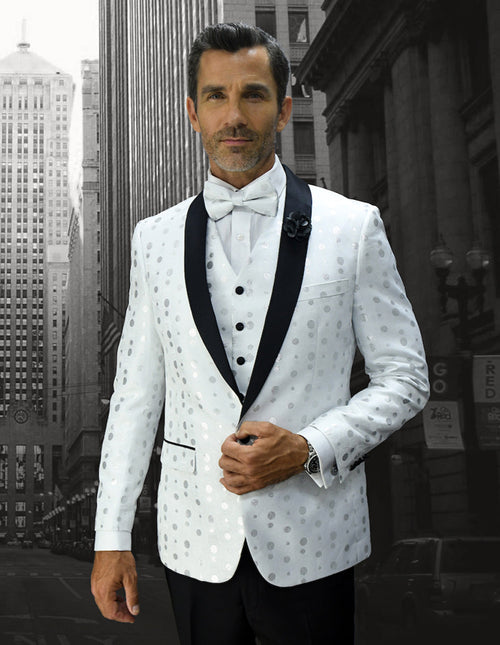 White tuxedo with silver polka dots. Black shawl lapel, single-button closure, and vest. Features side pocket with black trim. Shiny, formal fabric.