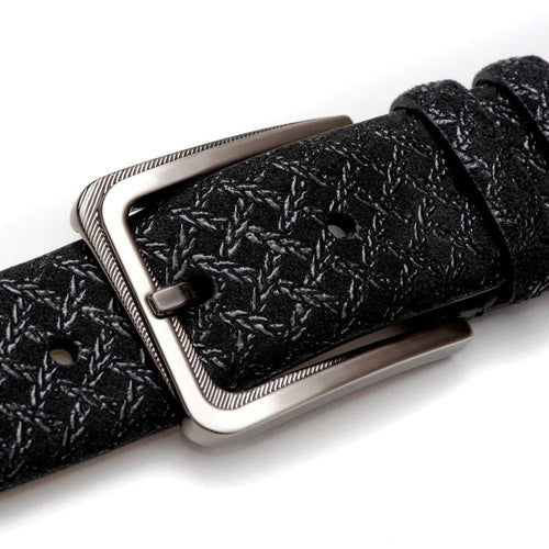 Black Mezlan belt with textured pattern and silver buckle. Adjustable with evenly spaced holes. A stylish and functional accessory.