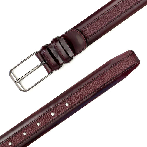 Burgundy Mezlan deerskin belt. Smooth leather with textured center. Polished metal buckle, adjustable fit. Luxurious and stylish.