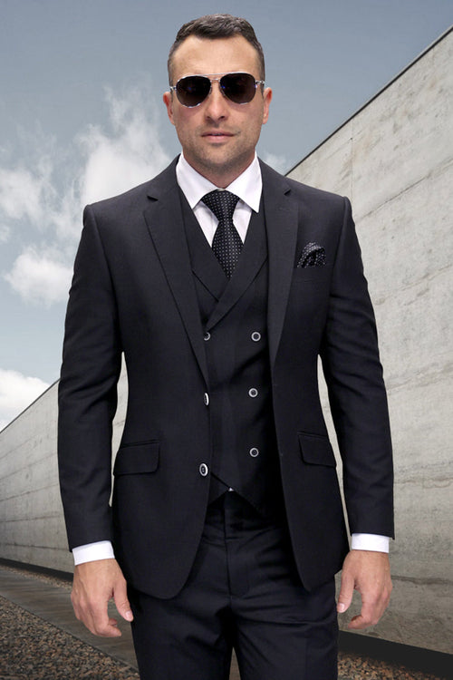 Men's charcoal grey wool suit with windowpane plaid. Modern fit, three-piece (jacket, vest, trousers). Tailored, formal look. Features a double-breasted vest and notch lapels.