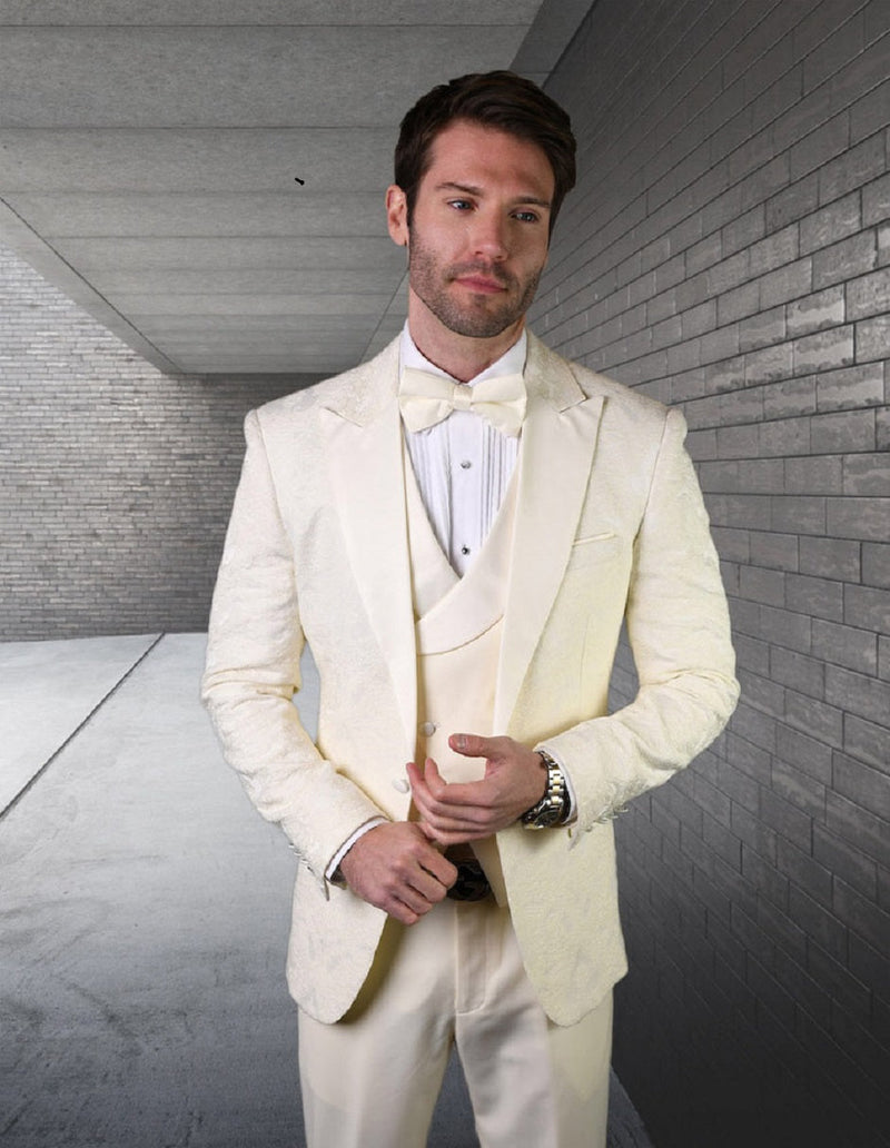 Ivory men's paisley tuxedo. Single-button, peak lapel design. Includes matching vest and trousers.