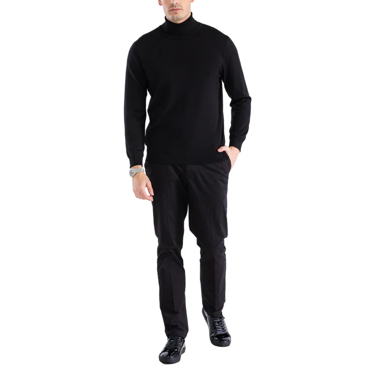 Alberto Nardoni men's black turtleneck sweater. Fitted silhouette, high neckline, and long sleeves tapering at the wrist. Smooth, solid black fabric. Fitted hem.