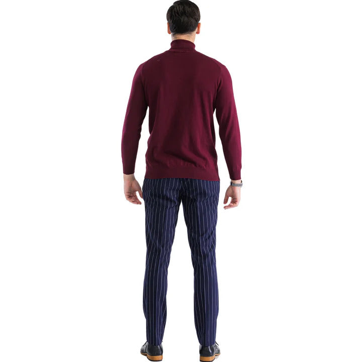 Burgundy men's turtleneck sweater. Fitted shape, high neck, long sleeves. Soft, textured material. Solid burgundy color, no patterns. Smooth back silhouette, tapering hem.