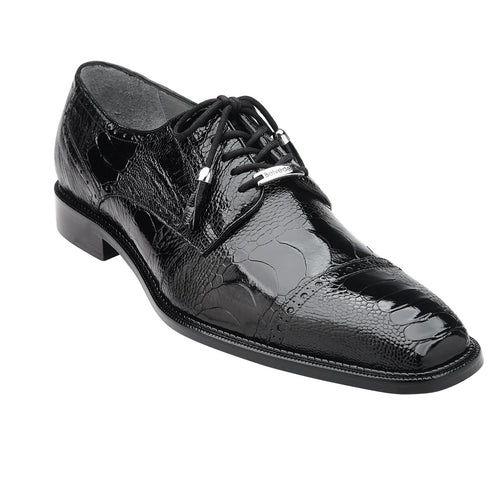Black ostrich leather Belvedere Batta cap toe dress shoe. Rounded silhouette, polished finish, and textured pattern. Features a classic lace-up design with metallic accents, a sturdy heel, and a smooth outsole.