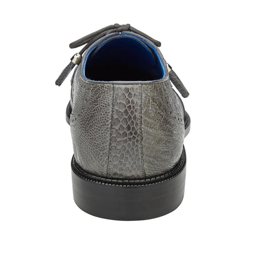 Grey ostrich leather Belvedere Battta cap-toe dress shoe. Rounded shape, textured exterior. Features grey laces, black rubber sole, and dark blue lining.