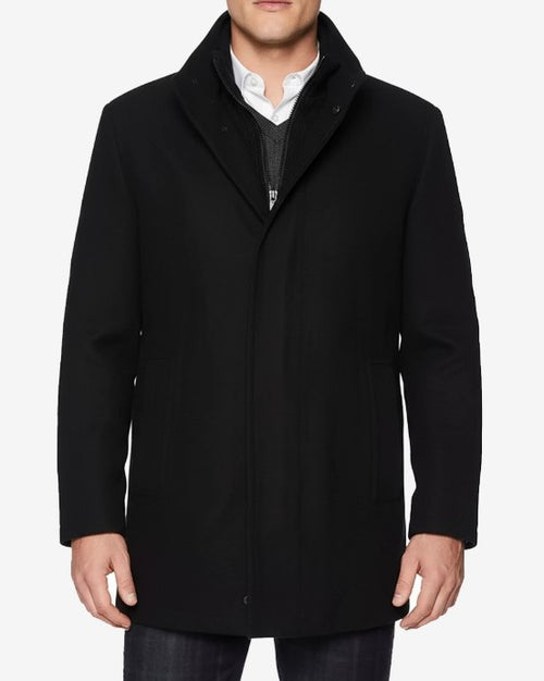 Men's black wool car coat: modern, straight fit. High collar, seamless long sleeves, solid black. Features side pockets and button closure. Mid-thigh length for a streamlined look.