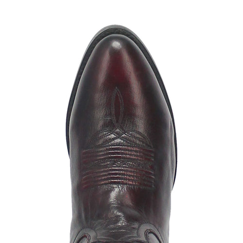 Dan Post Milwaukee cowboy boot. Men's round toe boot in cherry-black leather. Embossed toe pattern. Defined sole.