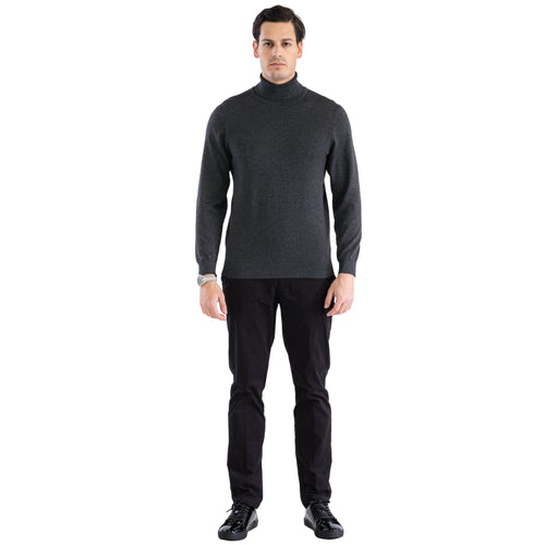Alberto Nardoni men's charcoal turtleneck sweater. Fitted design, high turtleneck, and dark gray, textured fabric. Long sleeves taper at the cuffs for a streamlined look.