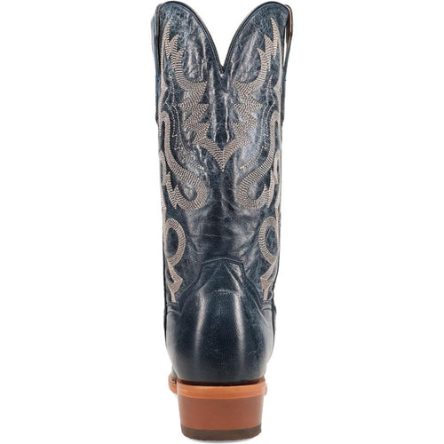 Dan Post Men's Calvin Blue boot. Dark blue leather, 13 toe, tall shaft with V-shaped top. Light stitching details. Contrasting heel. Sleek, fitted design.