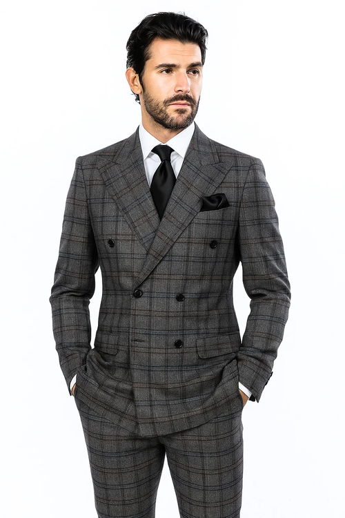 Charcoal suit crafted from 100% wool with a classic fit. Features baggy pleated pants and a blue plaid pattern. Double-breasted jacket with notched lapels and side pockets.