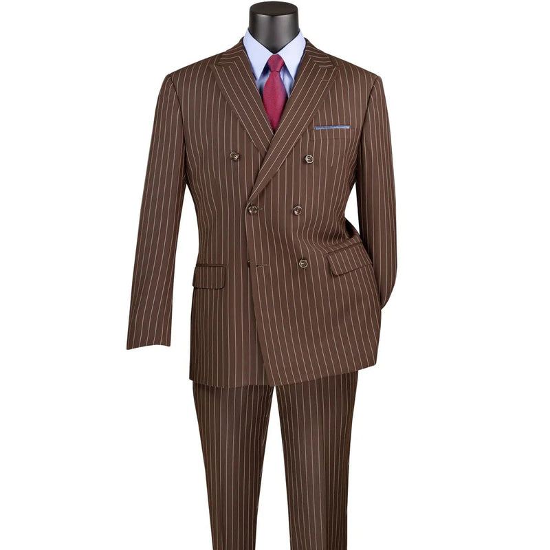 Brown pinstripe double-breasted suit. Classic six-button closure, notched lapel. Smooth fabric with vertical light brown stripes. Contrasting pocket square and buttoned jacket pocket. Trousers included.