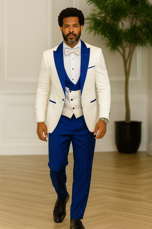 Hilton white tuxedo jacket with royal blue paisley lapel, matching shawl vest, solid royal blue wool pants, and bow tie.