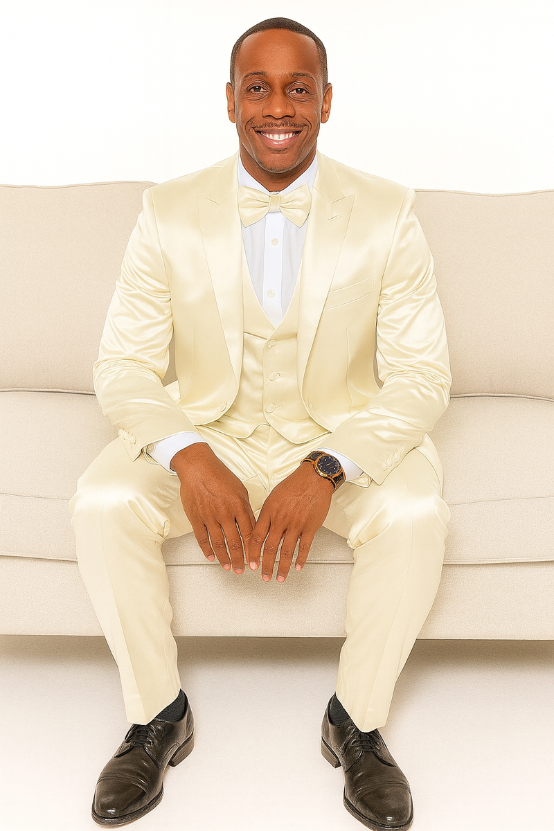 Men's champagne satin tuxedo set: slim fit, notched lapel blazer, waistcoat, flat-front trousers. Shiny satin fabric, champagne color. Includes white dress shirt & bow tie. Single-button jacket, side pockets, tailored trousers.