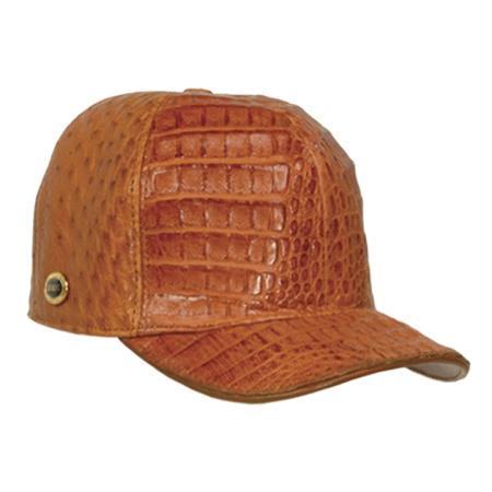 Cognac hornback leather baseball cap. Structured crown, rounded top. Textured embossed crocodile pattern. Curved brim. Metallic logo detail.