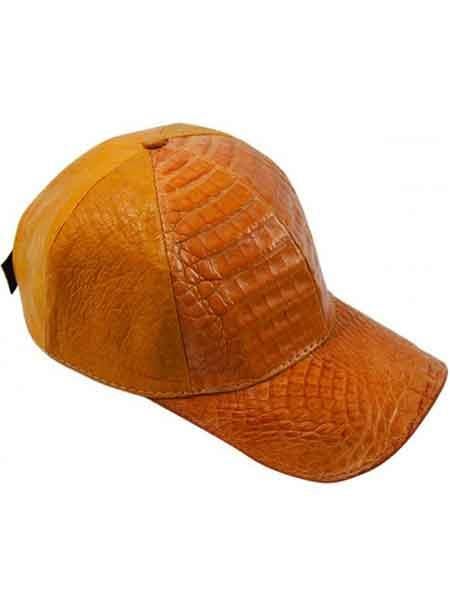 Orange ostrich-alligator skin baseball cap. Structured, rounded crown, curved visor. Textured finish mimics alligator scales. Exotic leather exterior. Black adjustable strap.