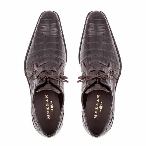 Mezlan men's Anderson shoes. Brown crocodile leather, pointed toe, streamlined design. Textured upper, lace-up closure, and sleek outsole.