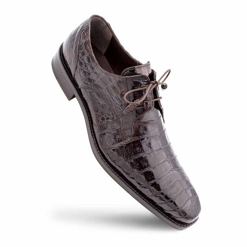 Mezlan men's Anderson brown crocodile lace-up shoes. Structured, pointed-toe design with a low heel. Glossy brown crocodile skin upper with scale patterns. Black sole. Simple brown lace closure.