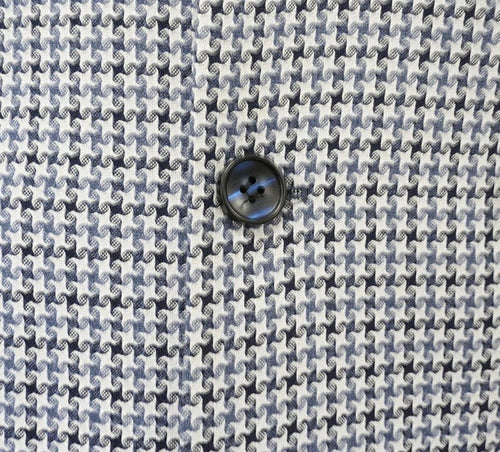 Blue houndstooth double-breasted jacket with a light/dark blue pattern. Features a black, four-hole button detail centered on the fabric.