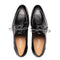 Mezlan Fratello black deerskin lace-up shoes. Men's split toe design with a sleek, rounded silhouette. Features textured black deerskin upper, matching laces, and a beige branded insole.