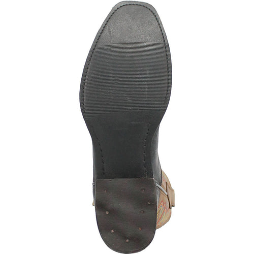 Black and tan leather western boot sole with pointed toe. Textured black bottom with horizontal grooves for traction. Streamlined shape and slightly raised heel. Classic western design.