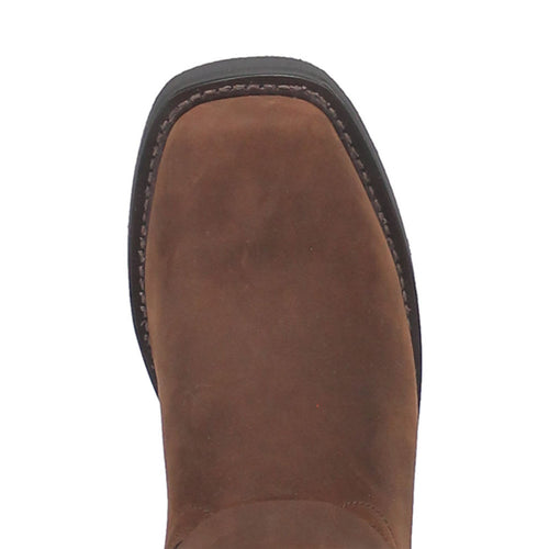 Dingo men's Gaucho leather harness boot. Brown suede with square toe and visible stitching. Durable sole with black outline. Structured, simple design.