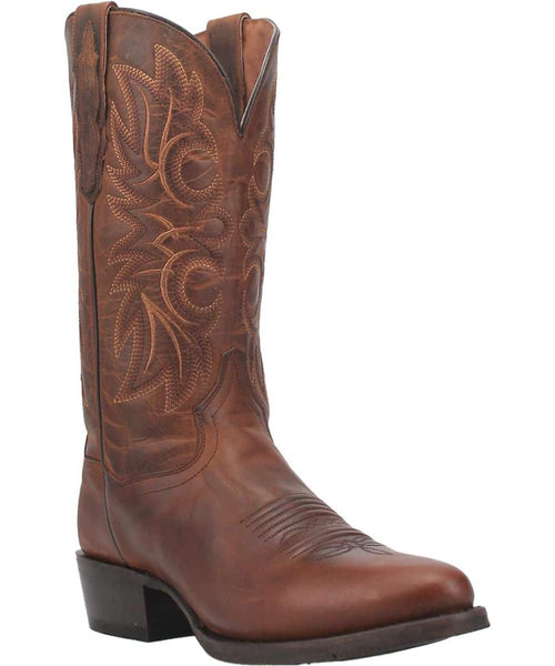 Dan Post Men's Cottonwood Boot: Brown leather with pointed toe, floral embroidery, and a structured, tall shaft. Features a raised heel, smooth finish, and scalloped top edge.