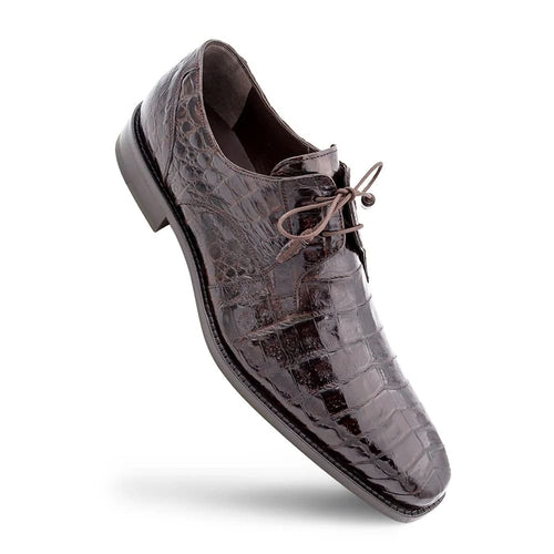 Mezlan Anderson men's exotic lace-up. Dark brown crocodile leather with shiny finish, elongated shape, and rounded toe. Traditional lace-up closure. Rubber sole with a slight heel. Textured crocodile skin.
