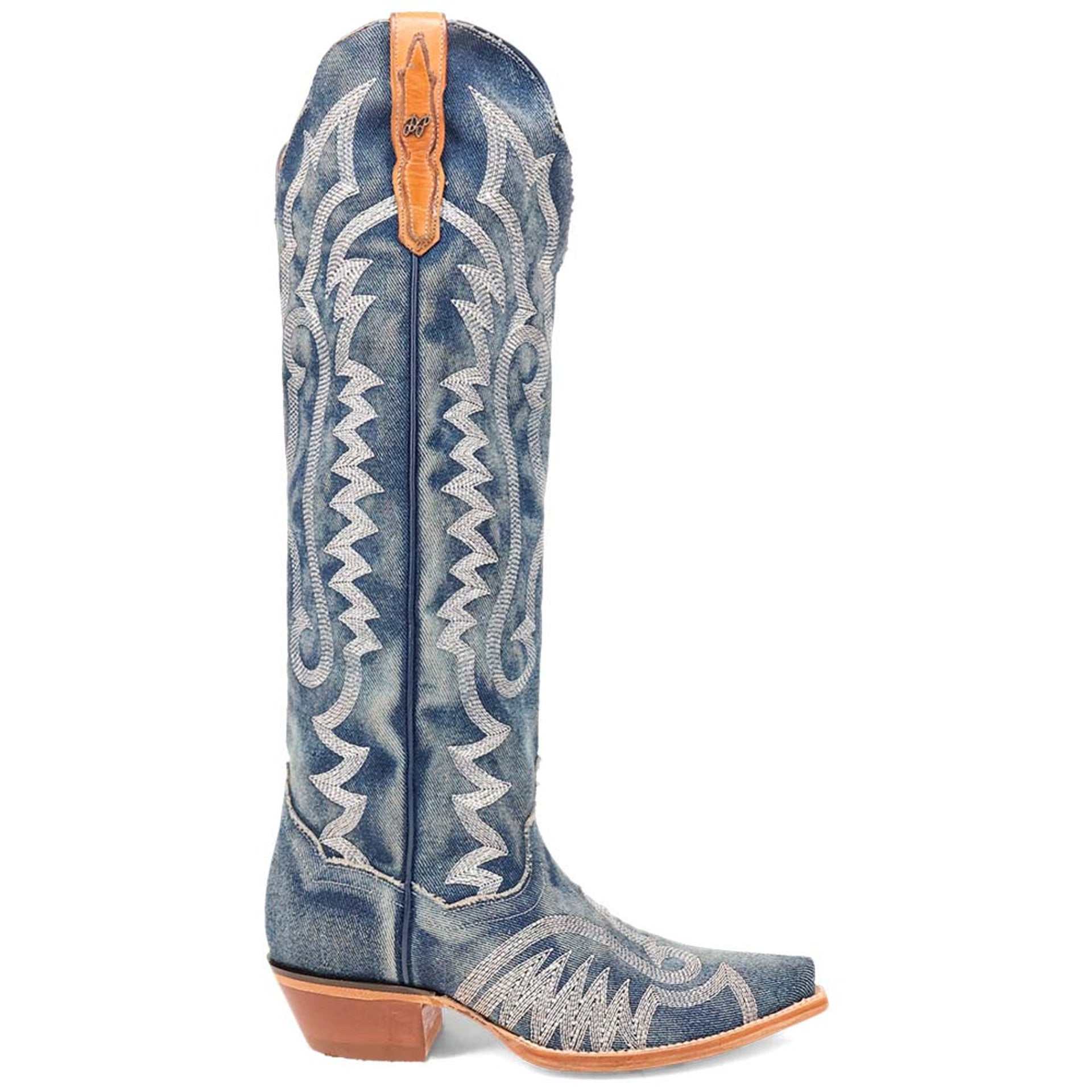Dan Post women's Darlin boots: tall blue denim shaft with silver embroidery, pointed toe, angled brown heel. Tan leather strap detail. Zipper closure.