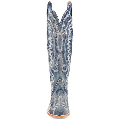Dan Post Darlin denim snip toe boots. Tall, fitted shaft with swirling embroidery. Denim blue with faded look, light brown sole. Side zipper closure.