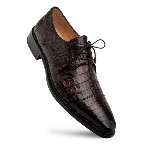 Men's Giovane Fuscus burgundy crocodile derby shoes. Sleek, pointed cap-toe design. Glossy burgundy crocodile leather upper with textured pattern. Rounded lace-up closure, black leather sole.