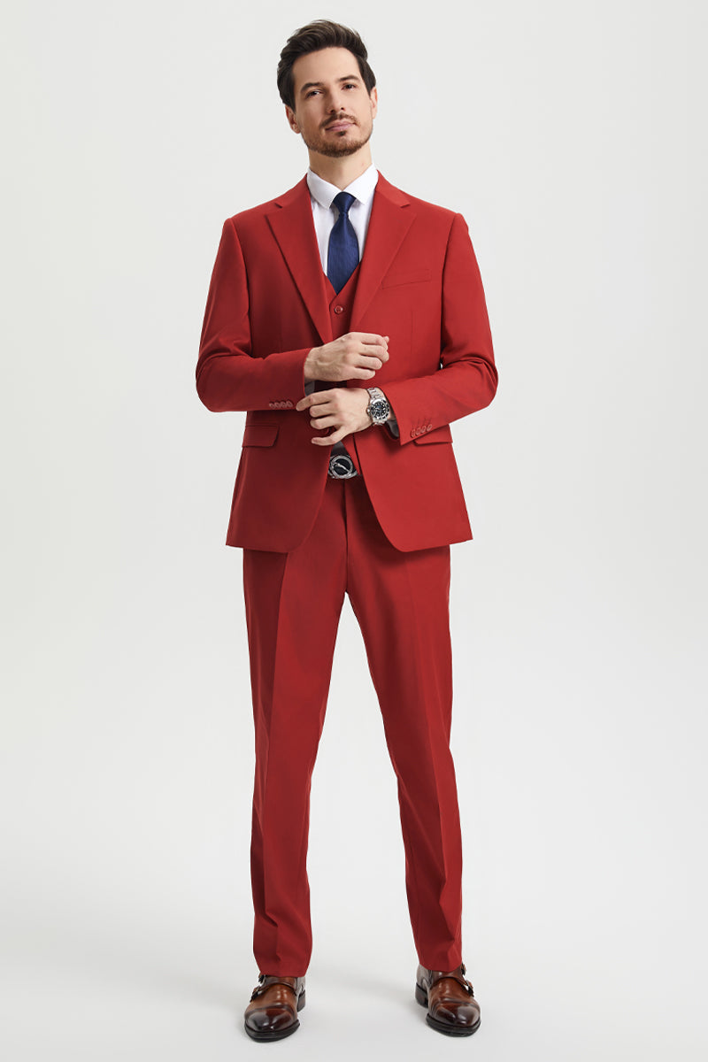 Men's Stacy Adams brick red suit: two-button fitted blazer, notch lapel, and matching trousers. Solid color, smooth fabric, three-piece design for a sleek, tailored look.