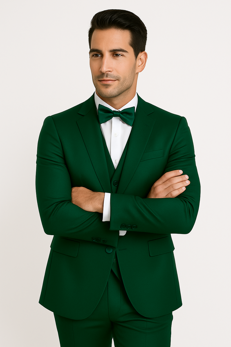 Alberto Nardoni 4-piece formal tuxedo set in emerald green. Includes a tailored jacket, waistcoat, dress pants, and bow tie. Features a smooth, consistent fabric and narrow lapels.