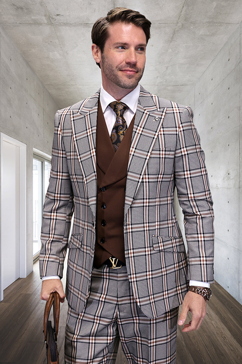 Tan houndstooth plaid suit with peak lapels. Features a brown vested interior, double-breasted design, and matching trousers. Visible buttons and pockets complete the tailored look.