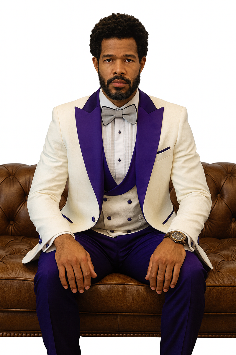 White tuxedo jacket with purple lapel & pockets. Includes a light shawl vest w/ purple buttons, purple wool pants, & bow tie. Fitted silhouette.