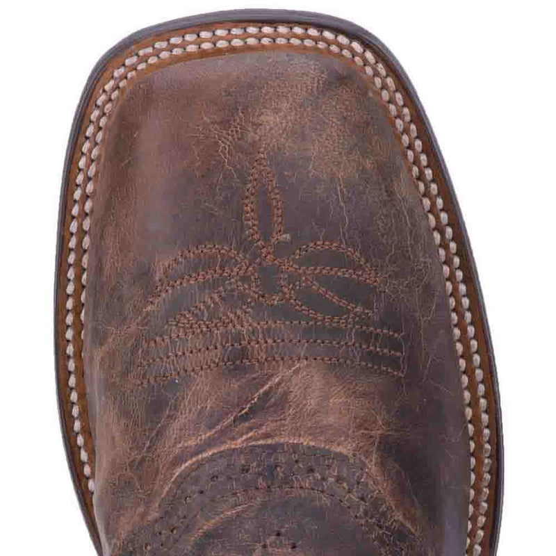 Dan Post Franklin boot. Dark chocolate leather, distressed finish. Broad square toe, decorative stitching, floral toe cap detail. Rugged, structured shape with contrasting edge stitching.