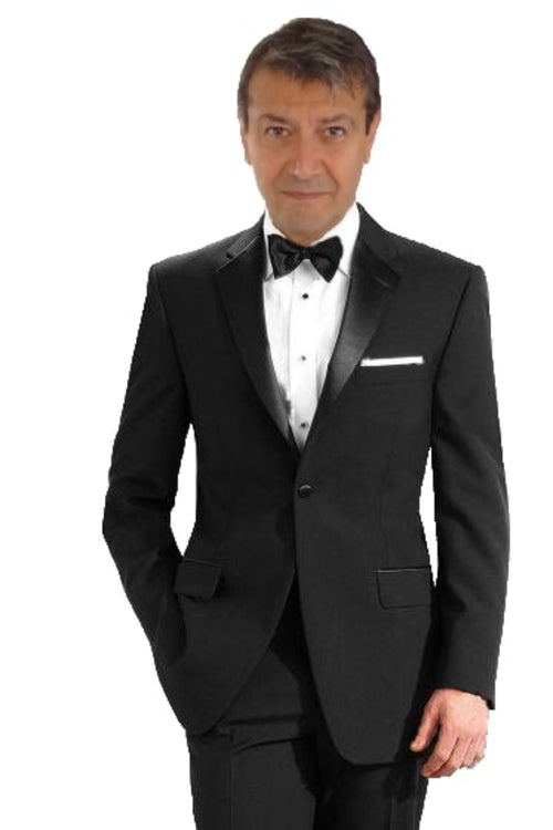 Mantoni 140s black wool tuxedo. Single-button, slim fit, structured shoulders. Satin lapel, tailored trousers, and white pocket square complete the formal look.