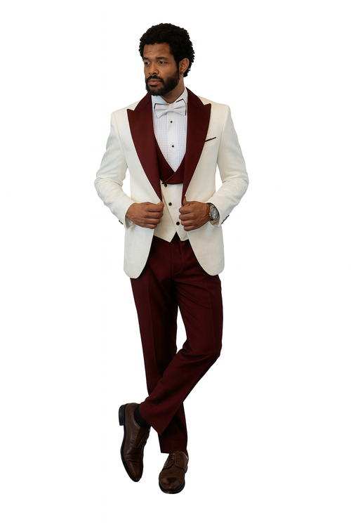White tuxedo jacket with burgundy peak lapel, matching vest and wool pants. Finished with a burgundy bow tie for a sophisticated look.