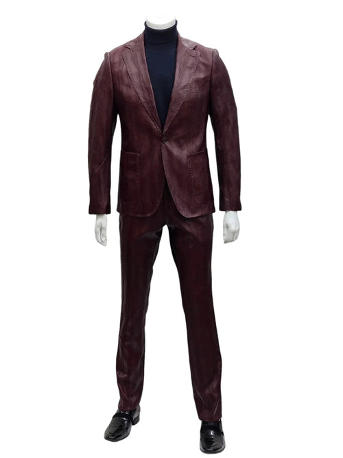 Burgundy Alberto Nardoni men's suit: single-button notch lapel jacket and matching trousers. Textured fabric in deep burgundy. Structured shoulders, fitted silhouette, formal style.