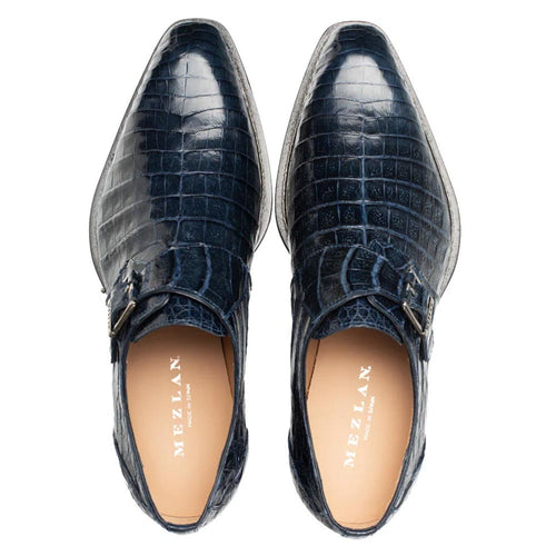 Mezlan Gigolo blue crocodile monk straps. Elongated, tapered shape with blue crocodile-embossed leather upper. Single monk strap with metal buckle. Pale leather interior. Meticulous stitching.